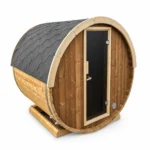 Sauna extérieur 3 Sauna électrique compact TimberIN Nordic Terrace 160 pour deux personnes, avec coque arrondie, bardage en bois clair et façade vitrée sur fond blanc
